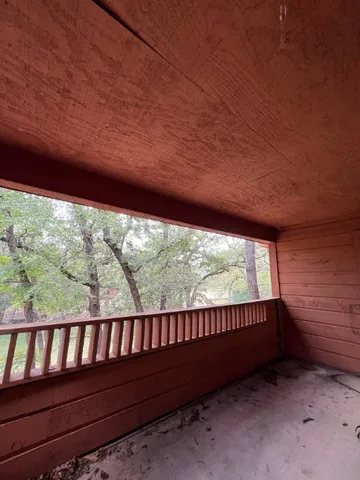 a view of balcony with deck