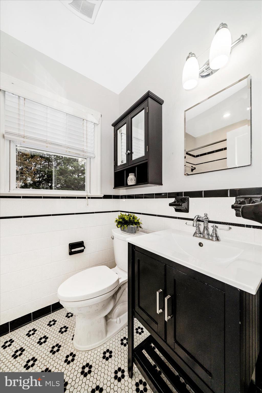 7604 Adelphi Road Hyattsville, MD 20783 - Photo 23 of 49 Hall Bathroom