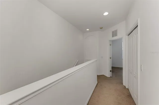 a bathroom with a bath tub with a shower