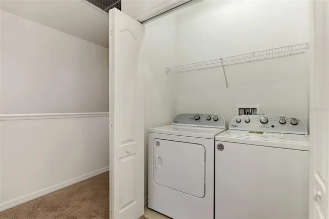 a view of a two chair in the balcony