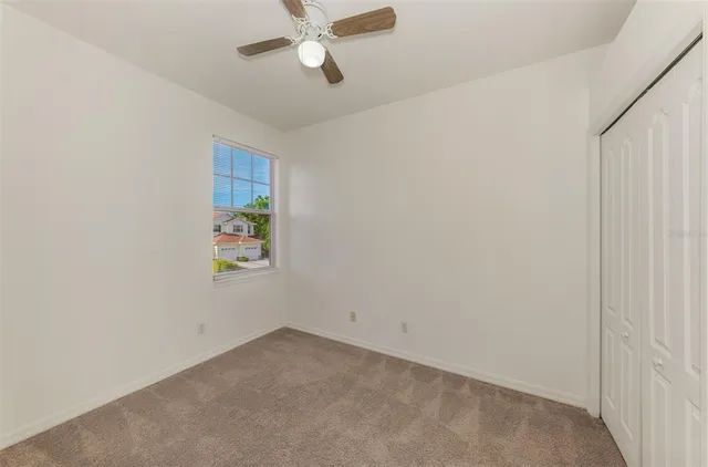 a view of a city with green space