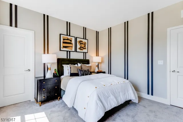 a bedroom with a bed and a cabinets