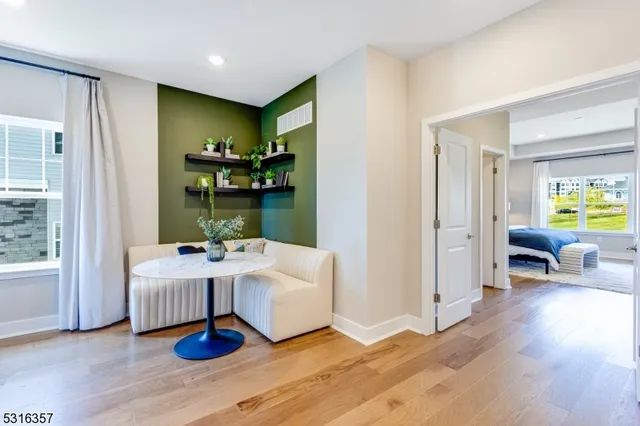 a living room with furniture and a table