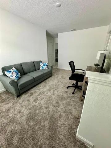 a bathroom with a double vanity sink and mirror