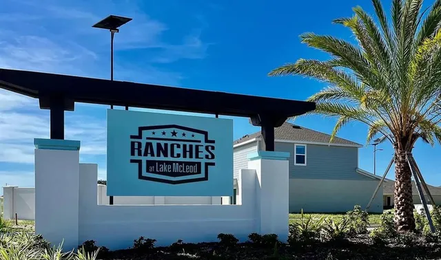 a view of a park with swings and slides