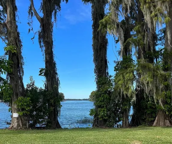 an aerial view of a houses with outdoor space