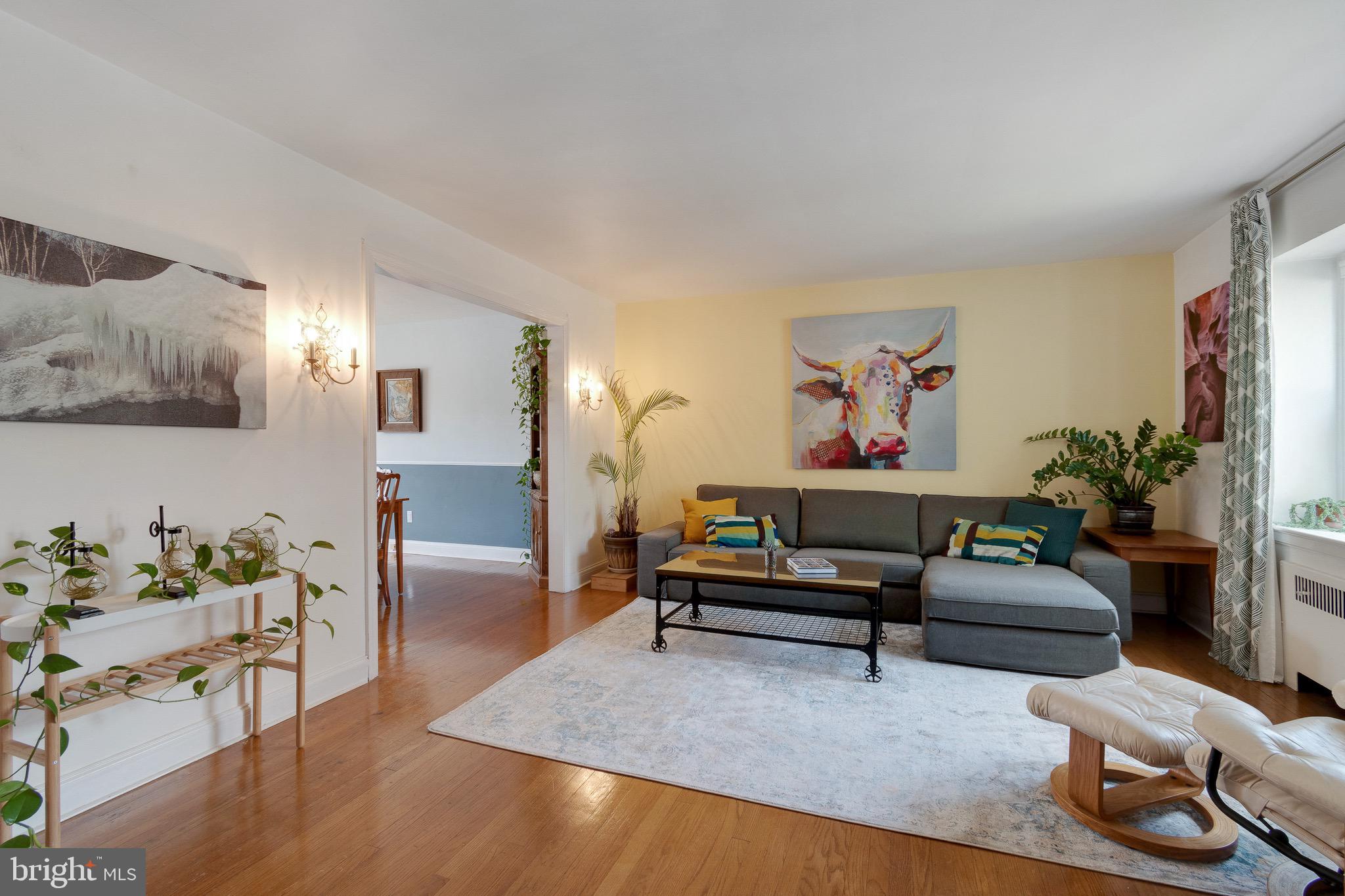 3707 Ednor Road Baltimore, MD 21218 - Photo 2 of 39 Light and Airy Living Room w/ Hardwood Floors