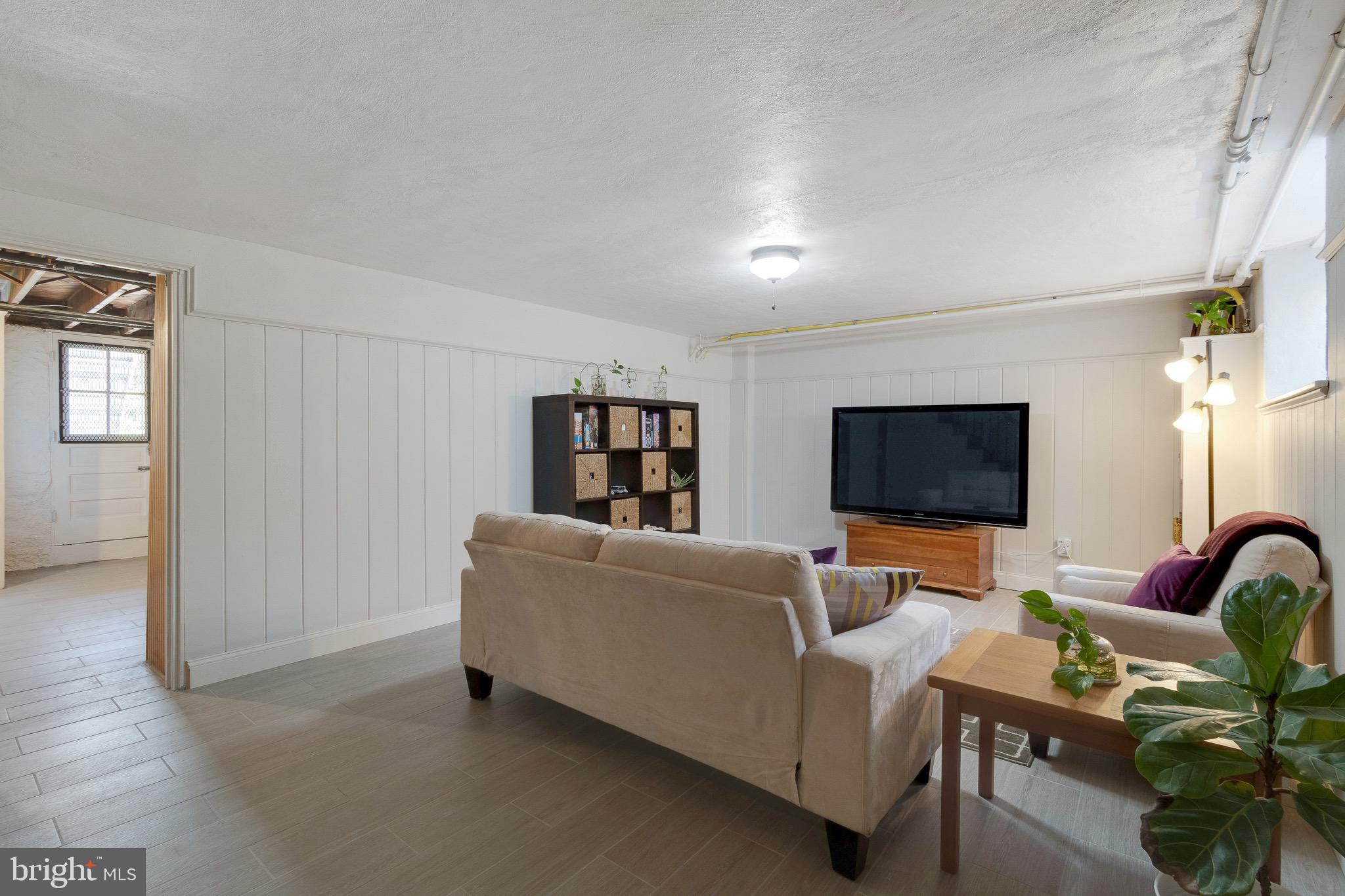 3707 Ednor Road Baltimore, MD 21218 - Photo 5 of 39 Stylish Lower Level Family Room