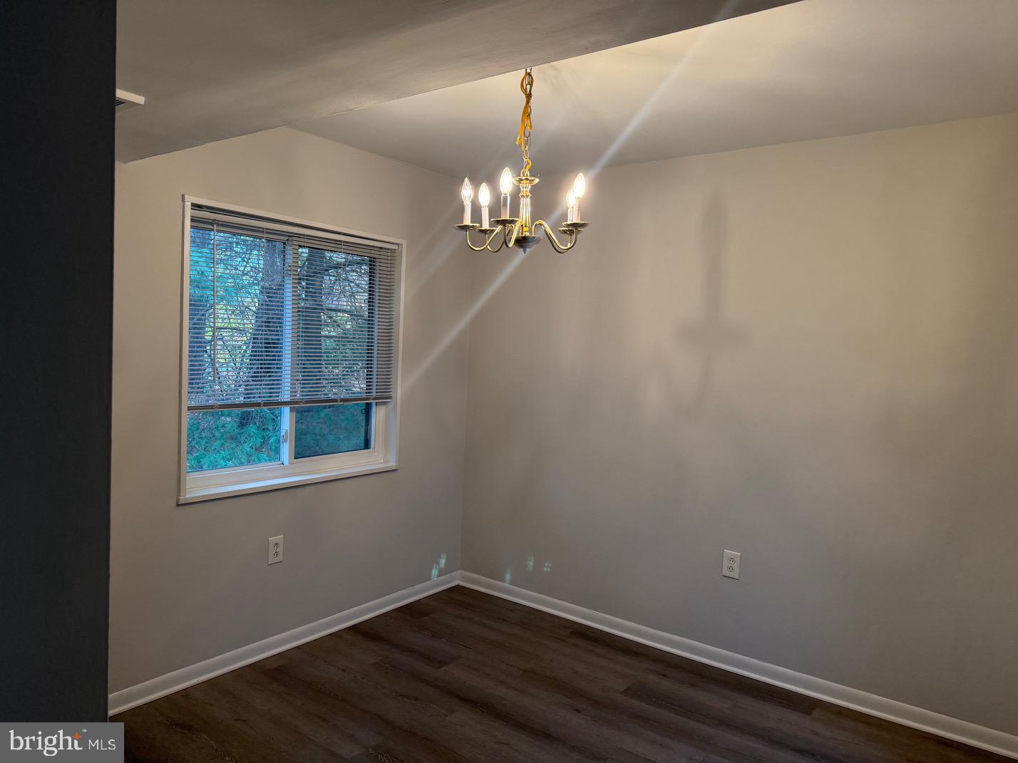 1400 Northgate Square, Unit 11A Reston, VA 20190 - Photo 12 of 21 wooden floor in an empty room with a window