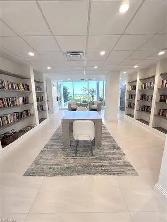 a view of a living room and kitchen
