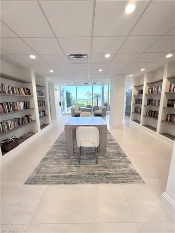 a view of a living room and kitchen