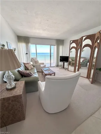 a living room with furniture and window