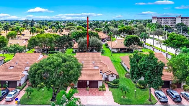 an aerial view of a house with a garden