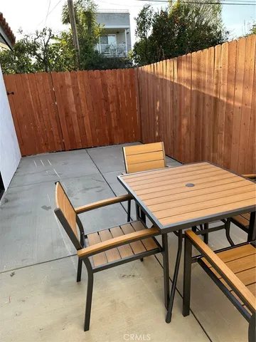 a wooden bench sitting in wooden floor