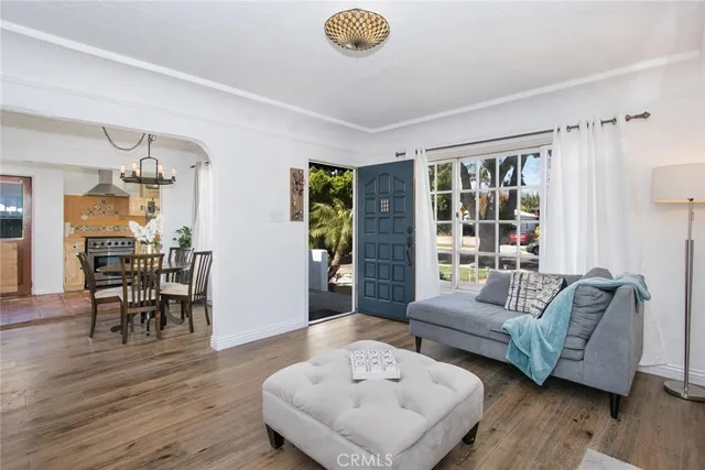 a living room with furniture and a table