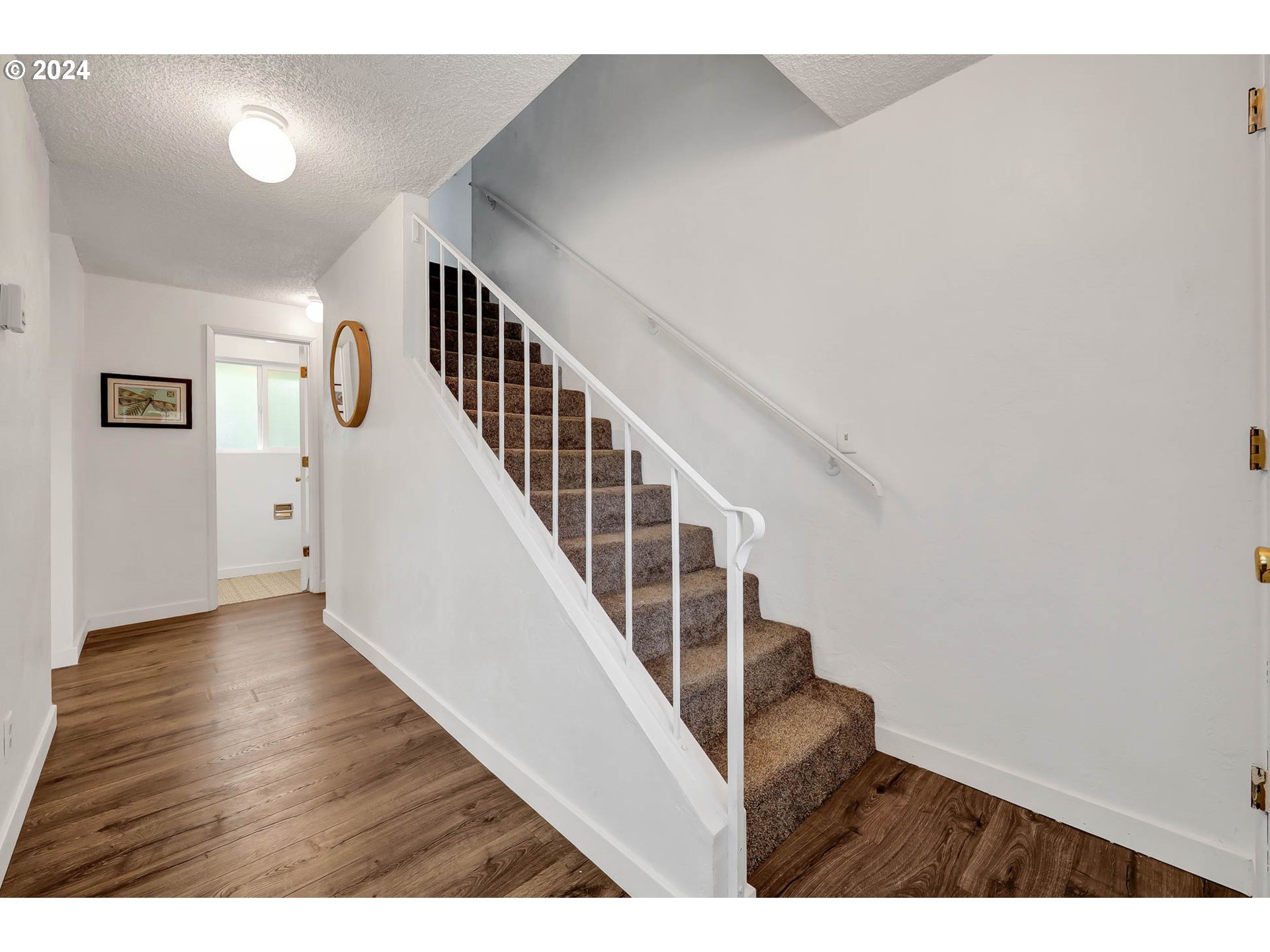 4250 Scenic Drive Eugene, OR 97404 - Photo 16 of 31 a view of entryway with wooden floor