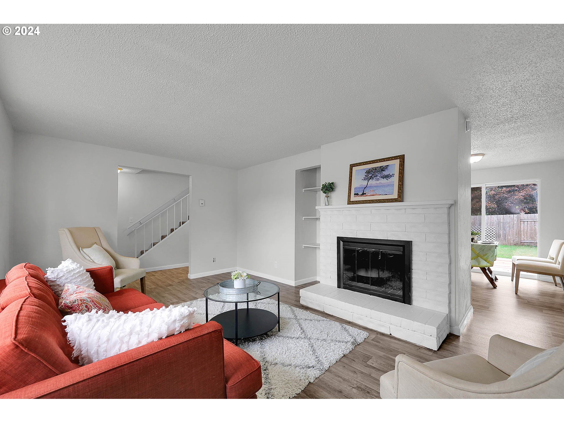 4250 Scenic Drive Eugene, OR 97404 - Photo 21 of 31 a bedroom with a bed and a fireplace