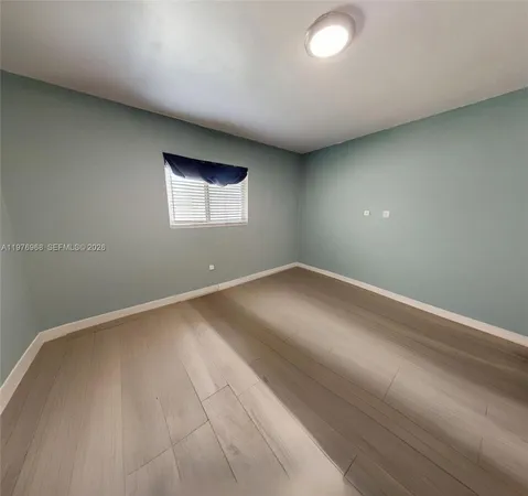 an empty room with a workbench