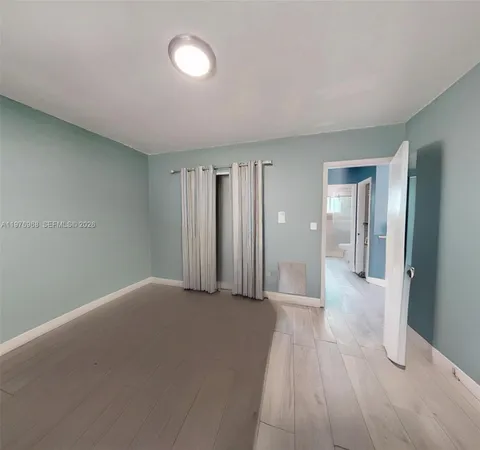 a view of a livingroom with a staircase