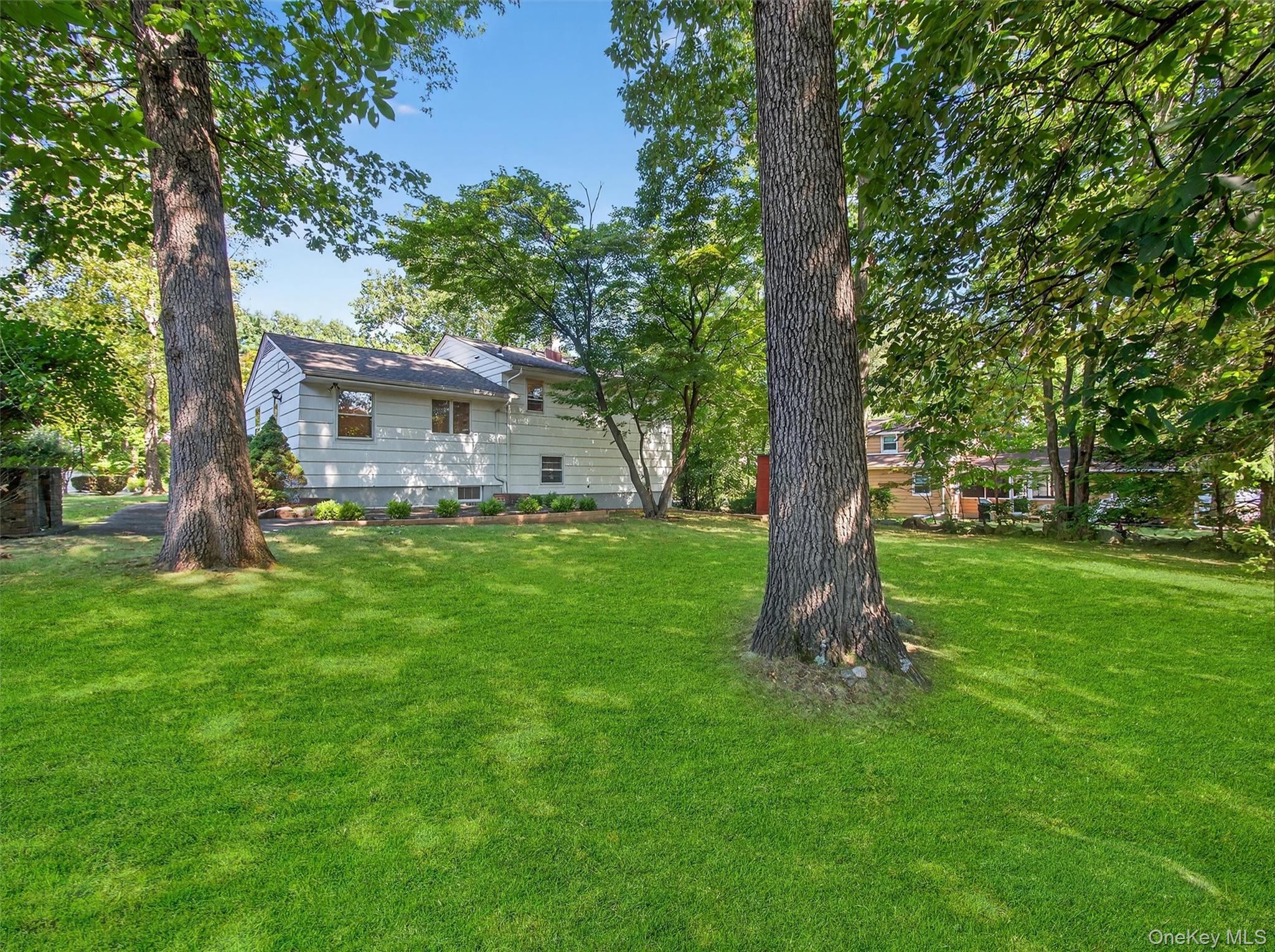 2 Beech Road Suffern, NY 10901 - Photo 23 of 24 a view of a house with a garden
