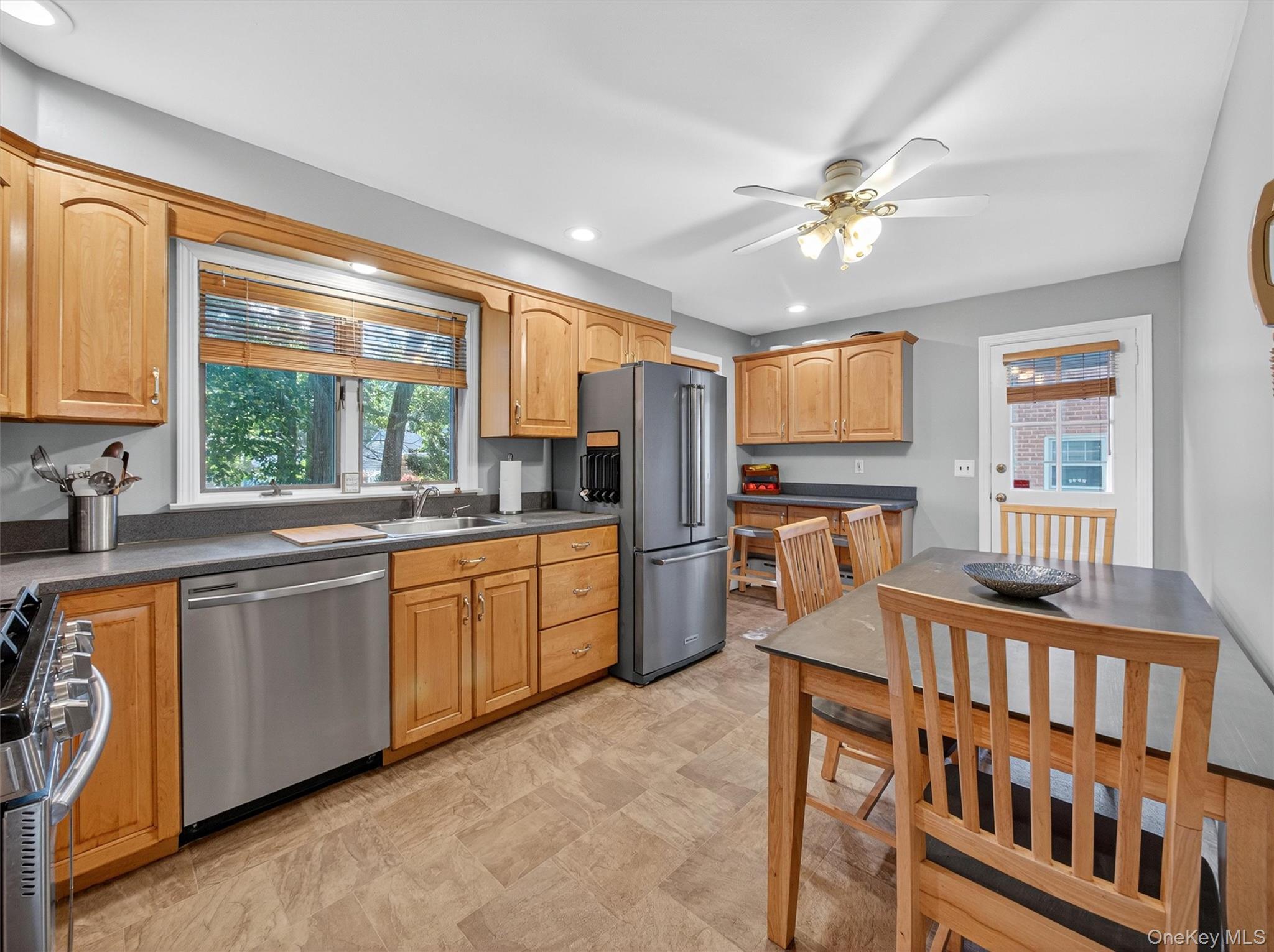 2 Beech Road Suffern, NY 10901 - Photo 4 of 24 a kitchen with stainless steel appliances granite countertop a refrigerator and a sink
