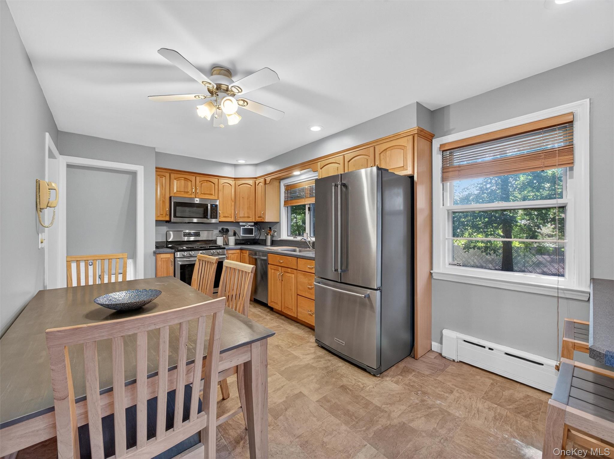 2 Beech Road Suffern, NY 10901 - Photo 5 of 24 a kitchen with sink refrigerator and microwave