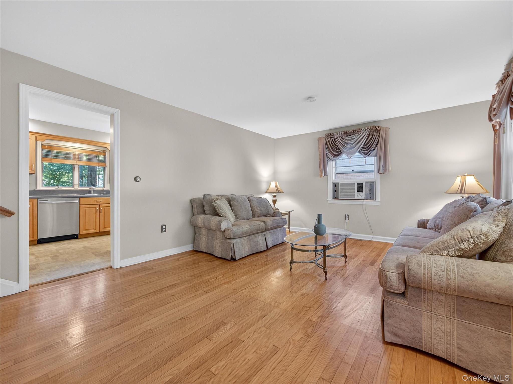 2 Beech Road Suffern, NY 10901 - Photo 8 of 24 a living room with furniture and a wooden floor