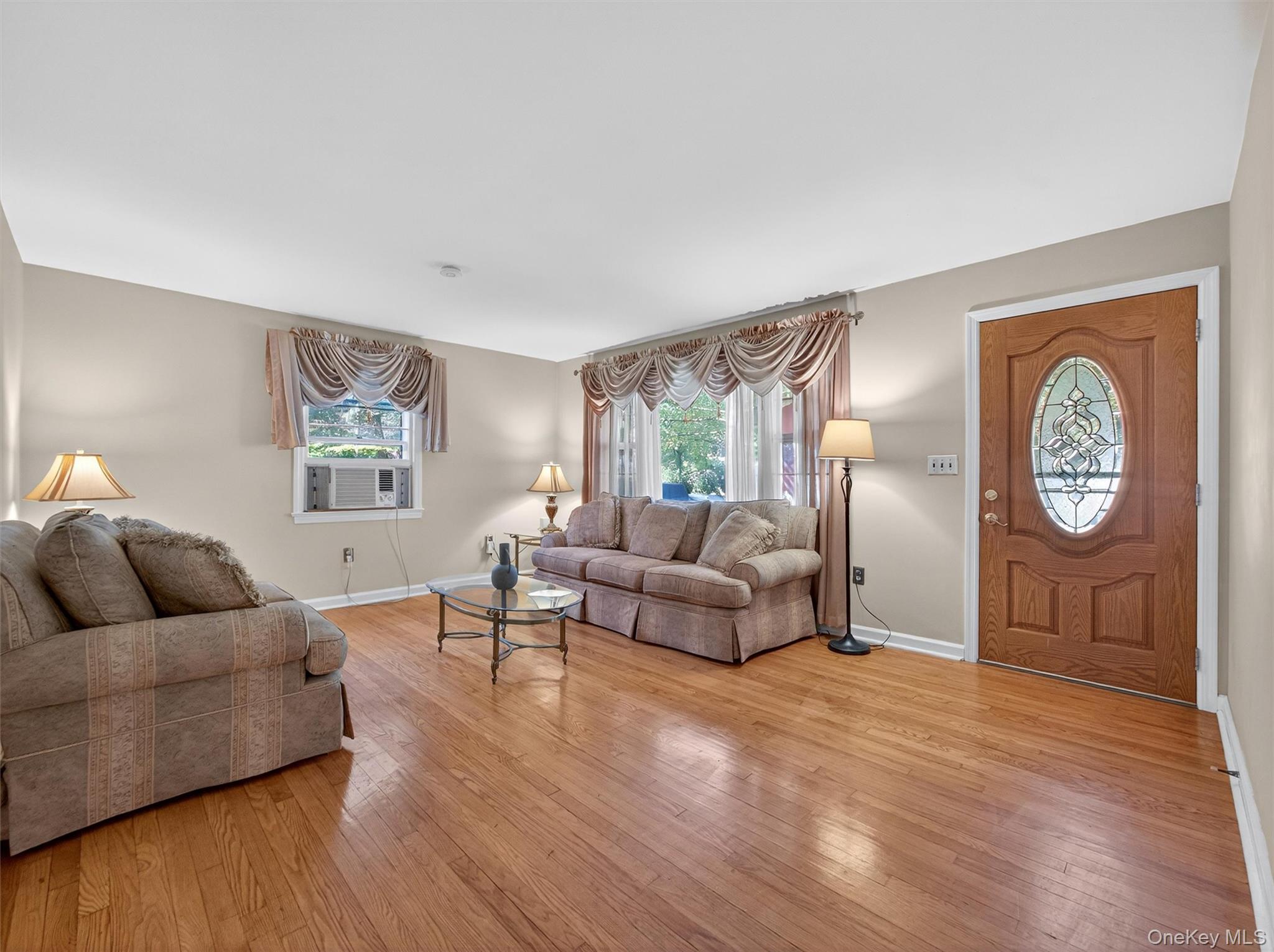 2 Beech Road Suffern, NY 10901 - Photo 9 of 24 a living room with furniture and a wooden floor