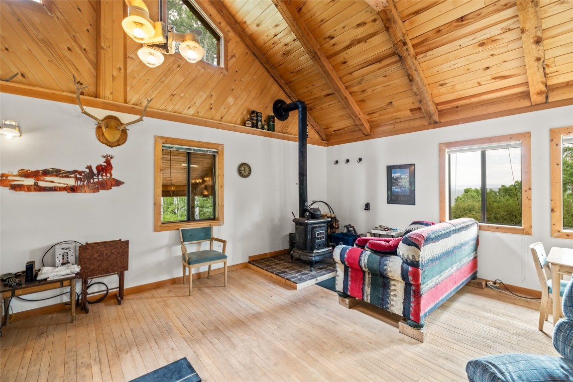 389 Routt Forest Loop Craig, CO 81625 - Photo 12 of 49 a living room with furniture and wooden floor