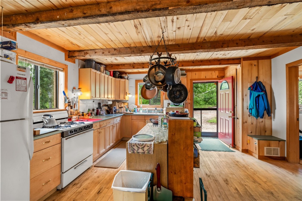 389 Routt Forest Loop Craig, CO 81625 - Photo 18 of 49 a view of a kitchen and dining room