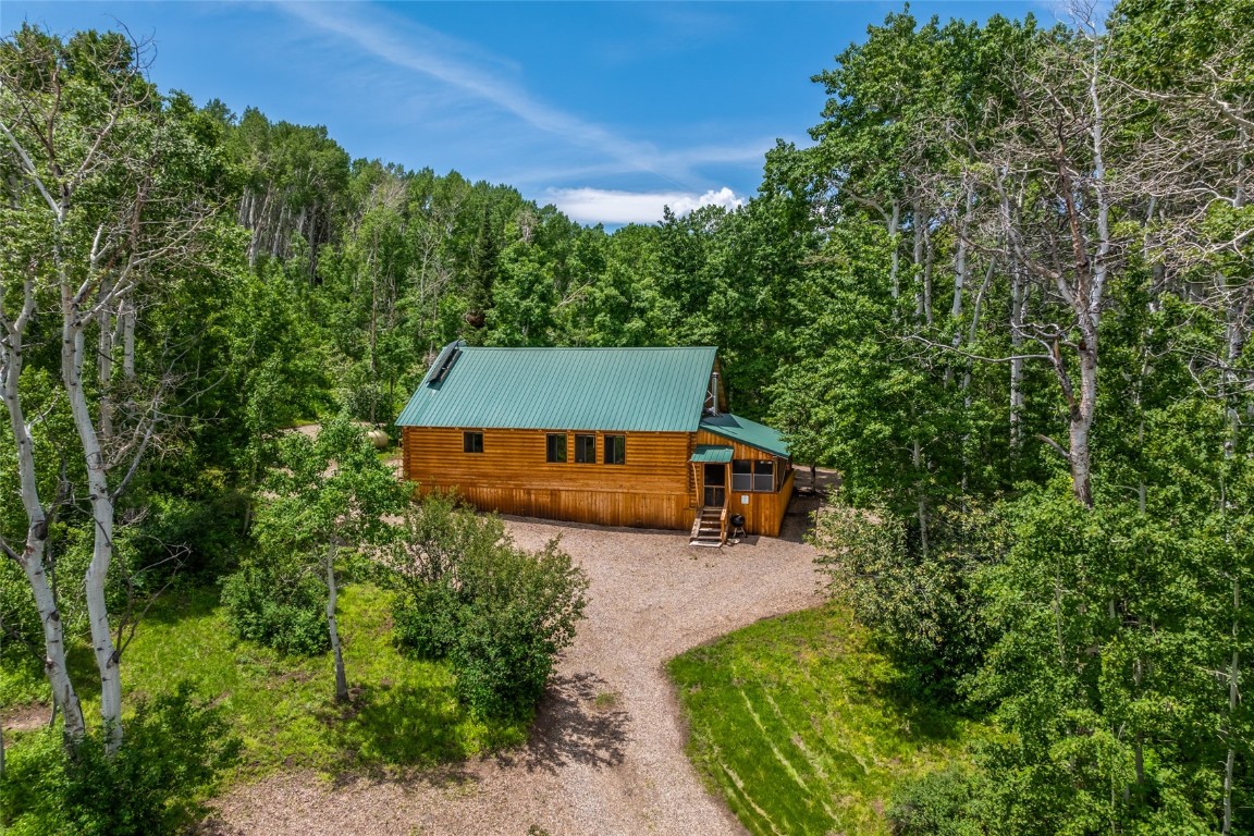 389 Routt Forest Loop Craig, CO 81625 - Photo 3 of 49 an aerial view of a house