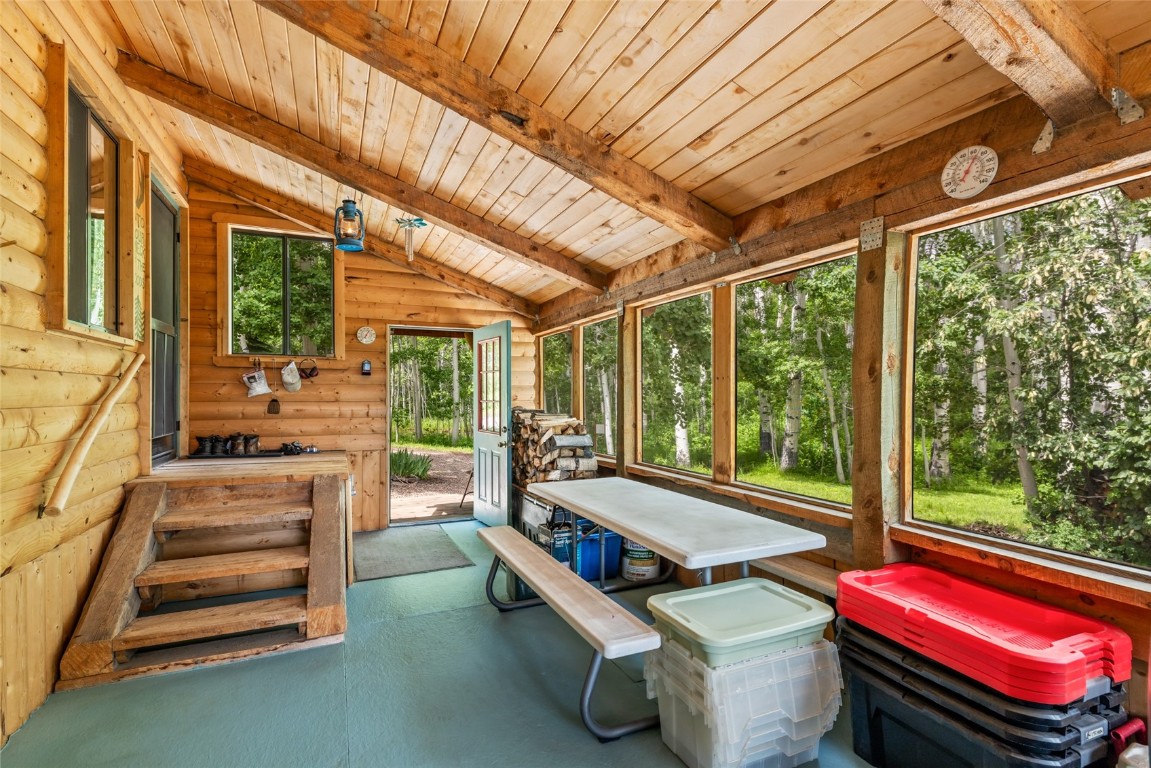 389 Routt Forest Loop Craig, CO 81625 - Photo 31 of 49 a room with pool table and windows