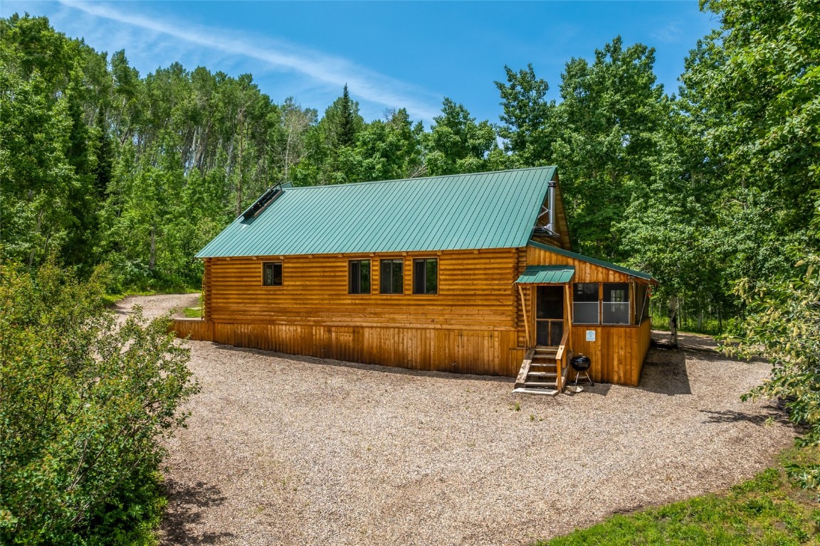 389 Routt Forest Loop Craig, CO 81625 - Photo 39 of 49 an aerial view of a house