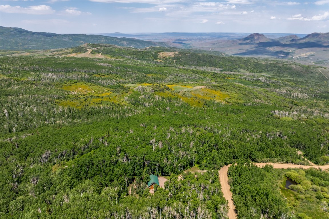 389 Routt Forest Loop Craig, CO 81625 - Photo 44 of 49 a view of an aerial view of residential houses with outdoor space and mountain view