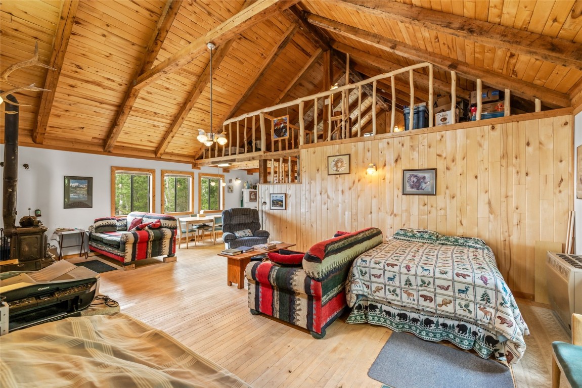 389 Routt Forest Loop Craig, CO 81625 - Photo 9 of 49 a bedroom with bed or couch and a window