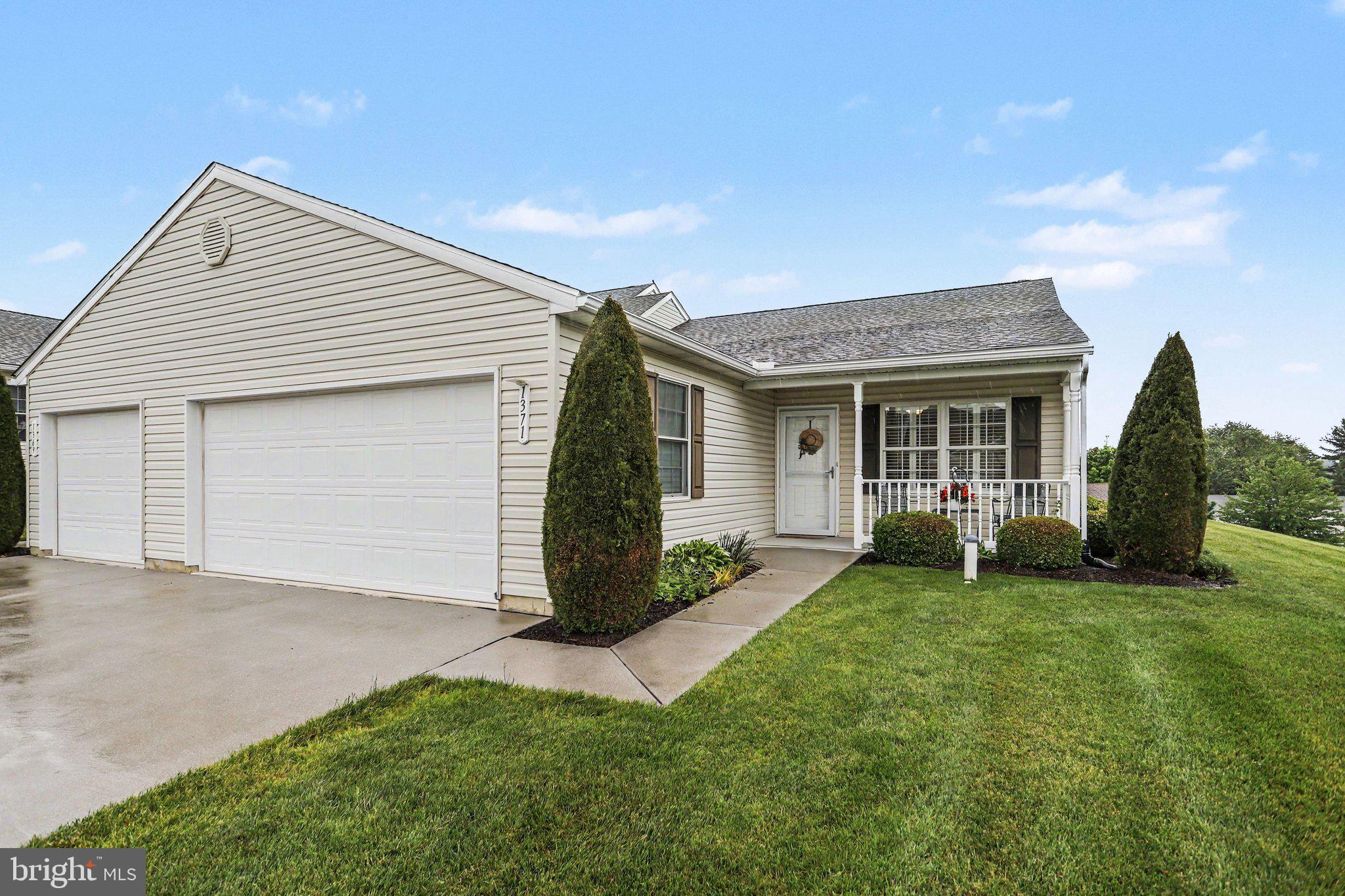 1371 Chami Drive, Unit 166 Spring Grove, PA 17362 - Photo 2 of 28 a view of a house with a yard