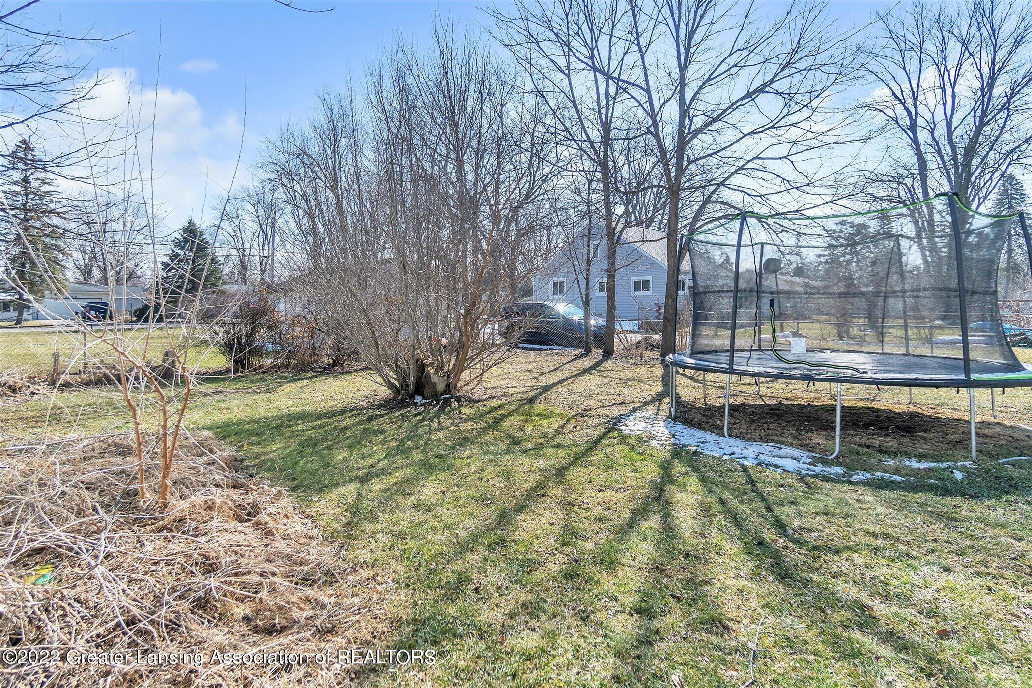 4621 Holt Road Holt, MI 48842 - Photo 24 of 28 Fenced in Backyard