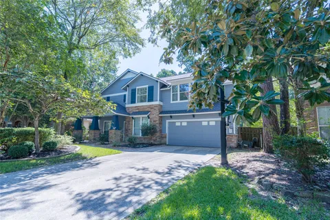 a view of a house with a swimming pool