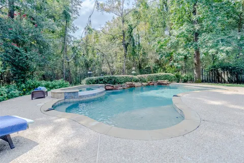 a view of a building with couches in front of house