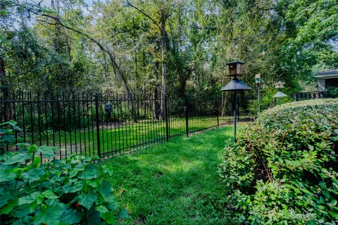 a view of a house with backyard
