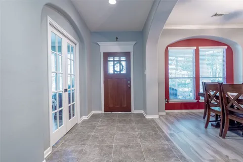 a view of a livingroom with furniture and window