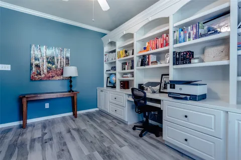 a room with furniture and a wooden floor