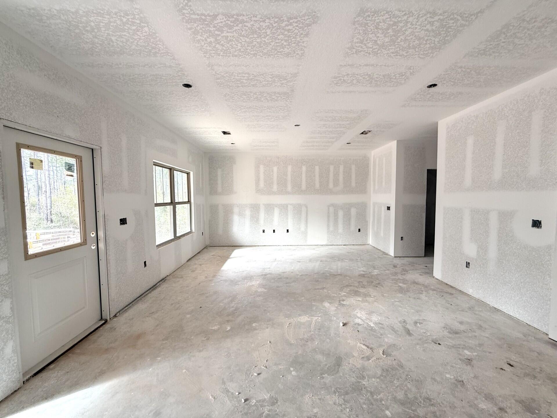 6695 Rocky Shores Road Milton, FL 32583 - Photo 14 of 53 a view of an empty room with a window