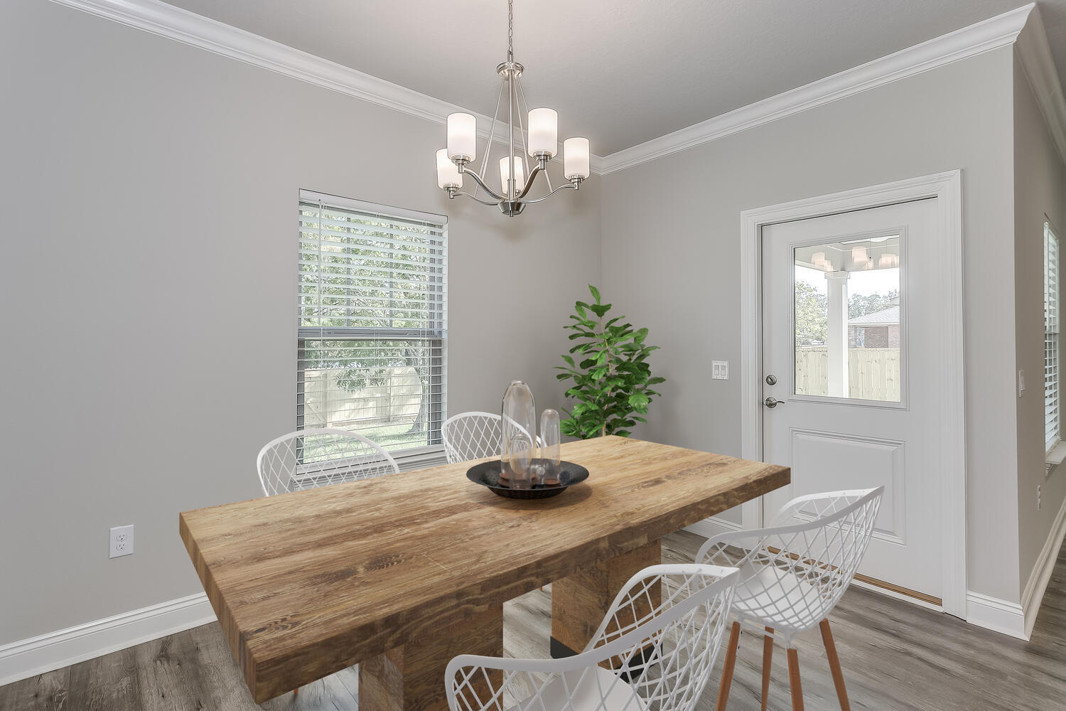 6695 Rocky Shores Road Milton, FL 32583 - Photo 16 of 53 a dining room with furniture and window