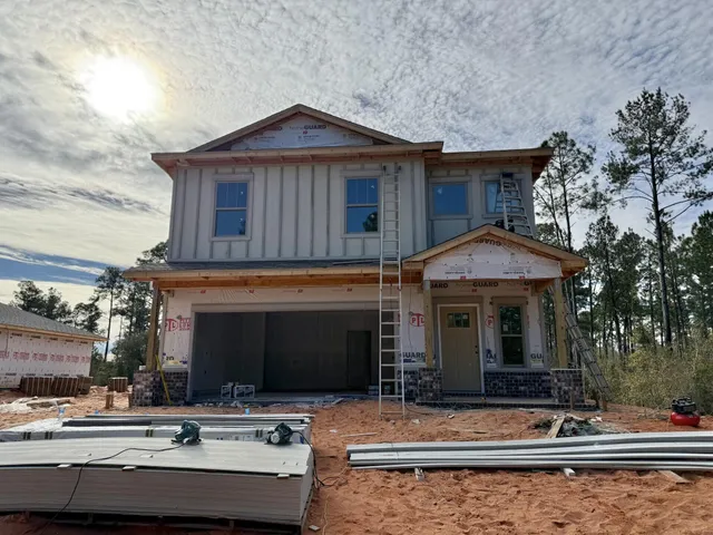 a front view of a house with swimming pool