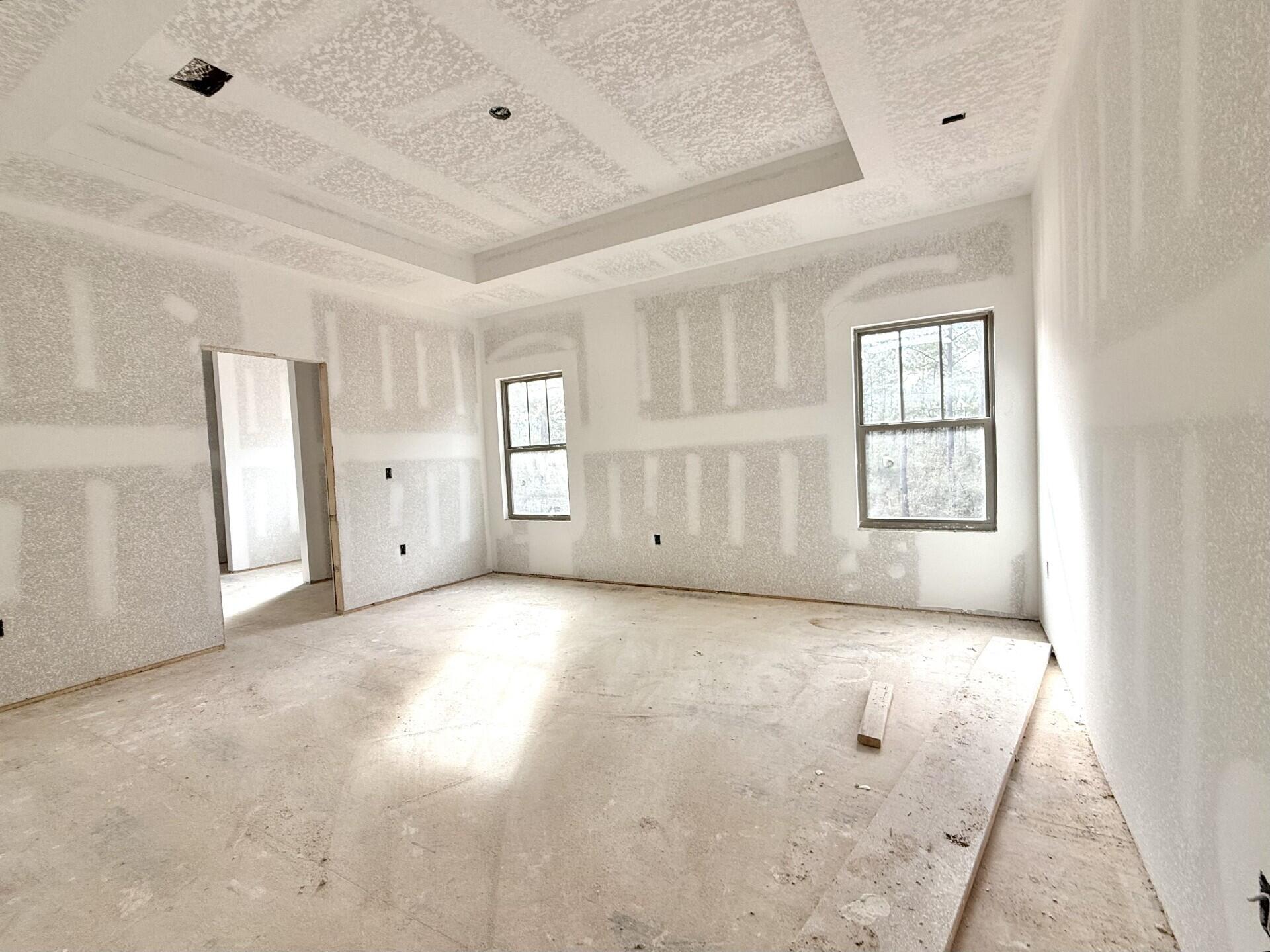6695 Rocky Shores Road Milton, FL 32583 - Photo 21 of 53 an empty room with windows and closet
