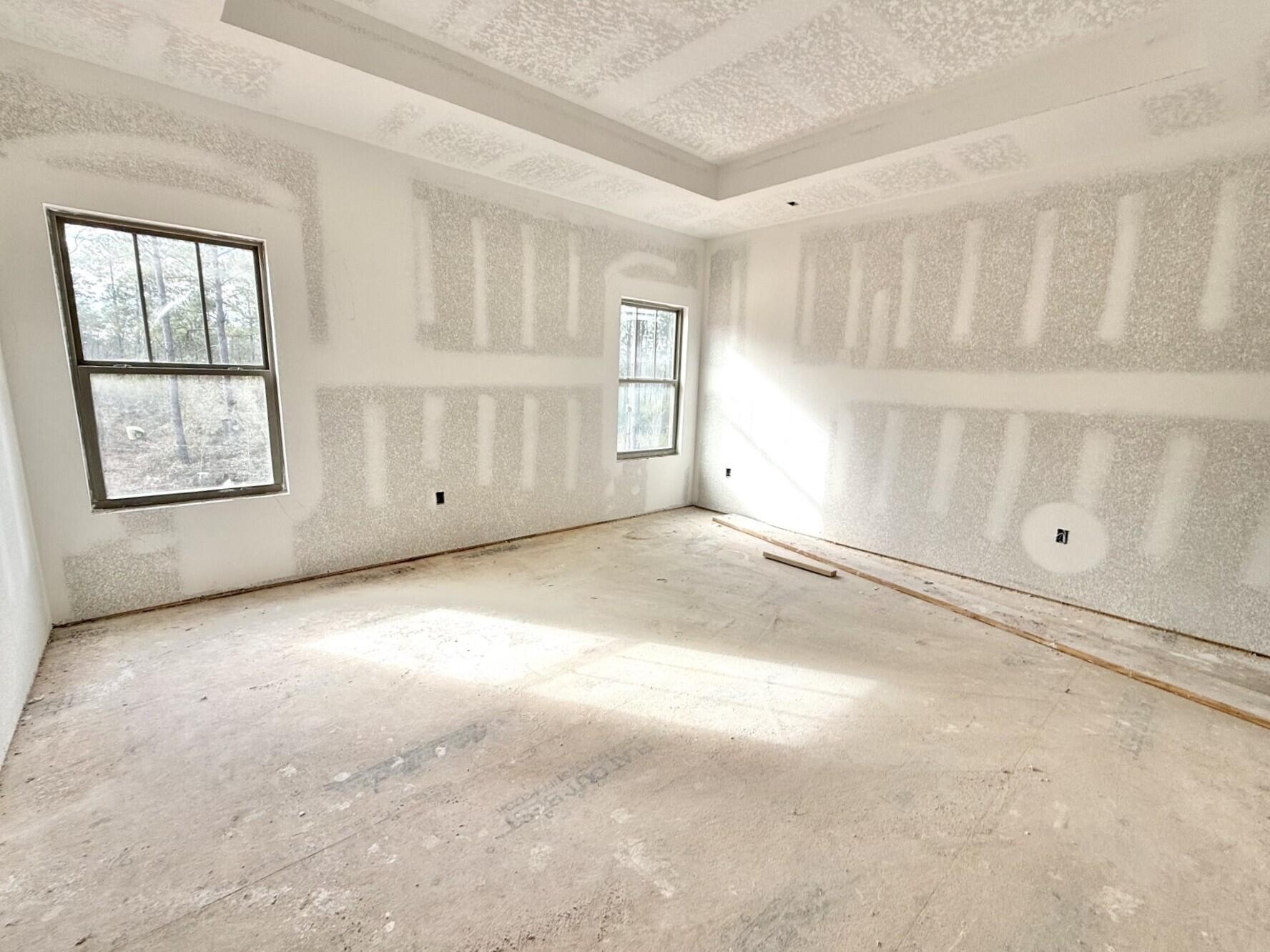 6695 Rocky Shores Road Milton, FL 32583 - Photo 23 of 53 an empty room with windows