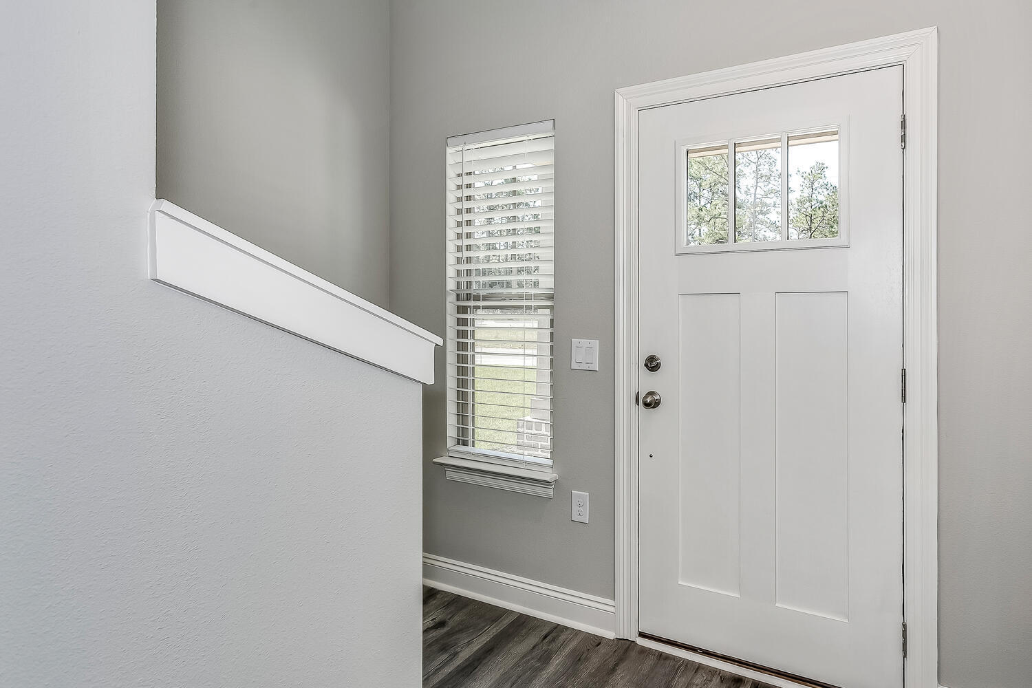 6695 Rocky Shores Road Milton, FL 32583 - Photo 4 of 53 a view of an entryway with wooden floor