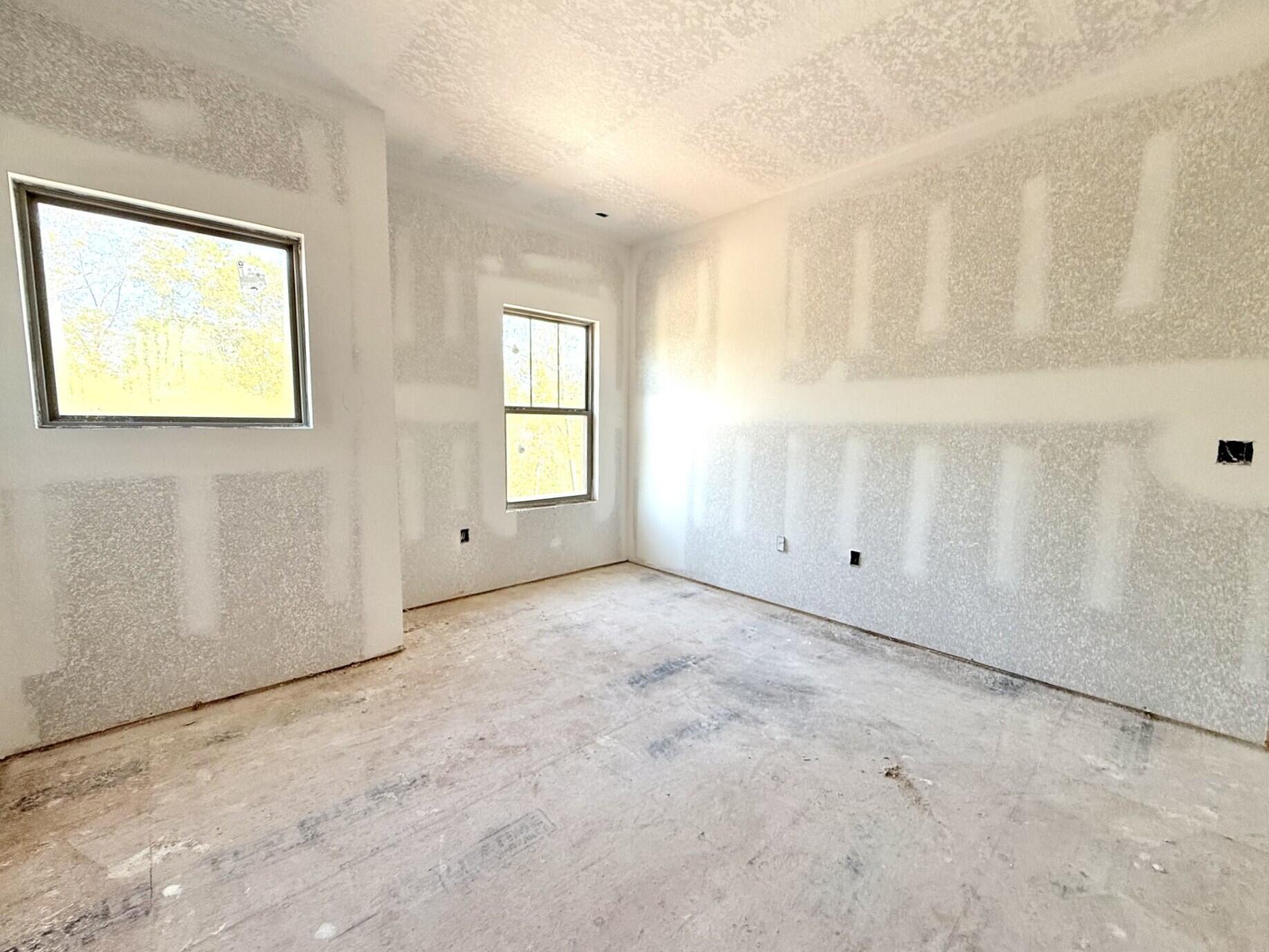 6695 Rocky Shores Road Milton, FL 32583 - Photo 42 of 53 an empty room with windows