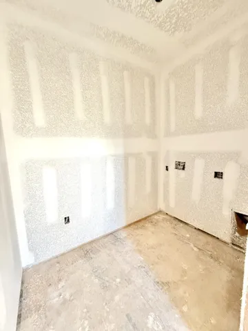 a backyard of a house with swimming pool